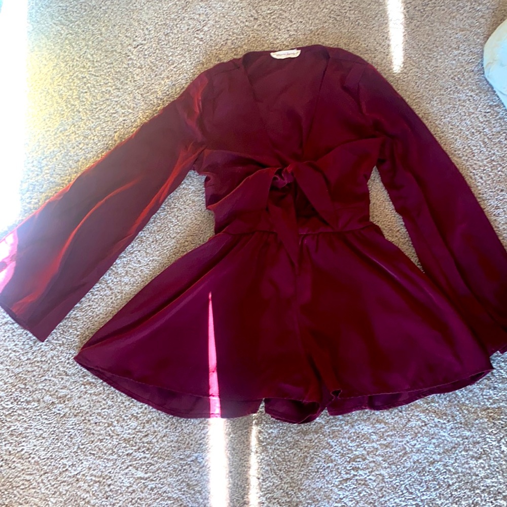 Maroon romper with a tie front